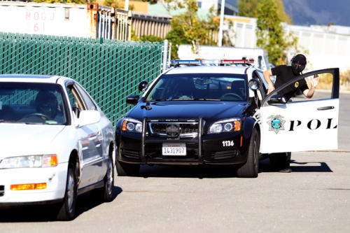 Richmond police officer Michael Brown, right, and detective Mauricio Canelo participate in a car stop exercise where Brown and Canelo, as the civilian